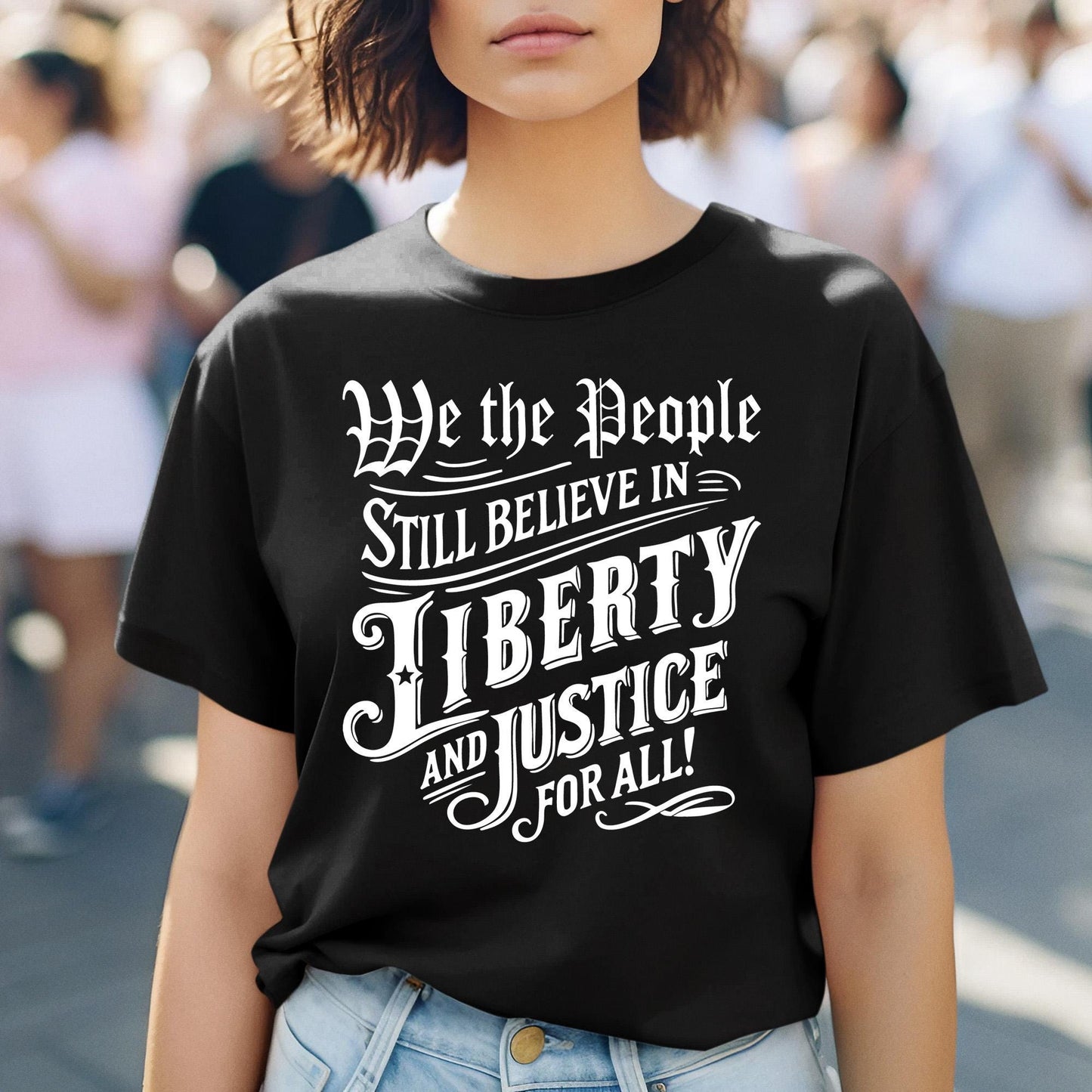 Fourth of July American pride shirt with powerful We the People Still Believe in Justice for All message, democracy-themed patriotic apparel for freedom lovers and equality supporters.