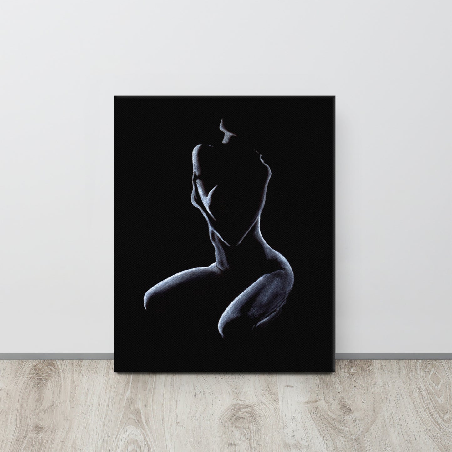 Graceful pastel figure drawing reference photo of a canvas print sitting on the floor against a white wall. Canvas size is 16x20.