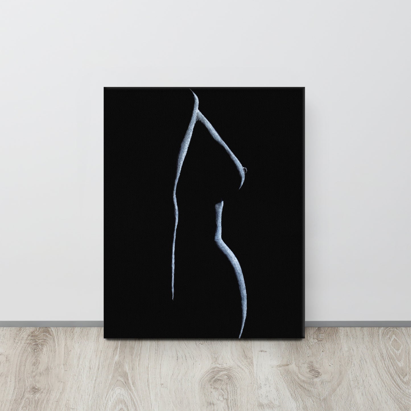 Graceful pastel figure drawing reference photo of a canvas print sitting on the floor against a white wall. Canvas size is 16x20.