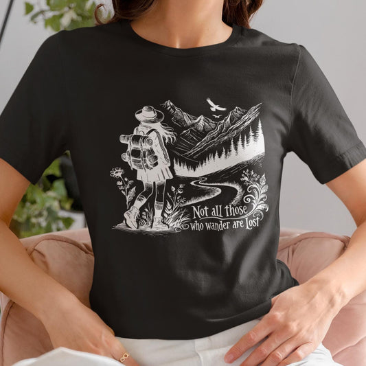 Show your love for adventure with the &quot;Not All Who Wander Are Lost&quot; shirt, a wanderlust-inspired travel shirt that&#39;s perfect for explorers and campers.