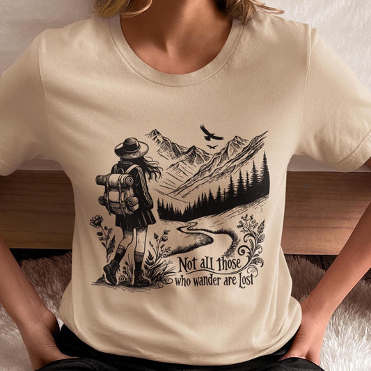 Embrace adventure with the &quot;Not All Who Wander Are Lost&quot; shirt, an inspirational travel tee perfect for wanderlust lovers and campers.