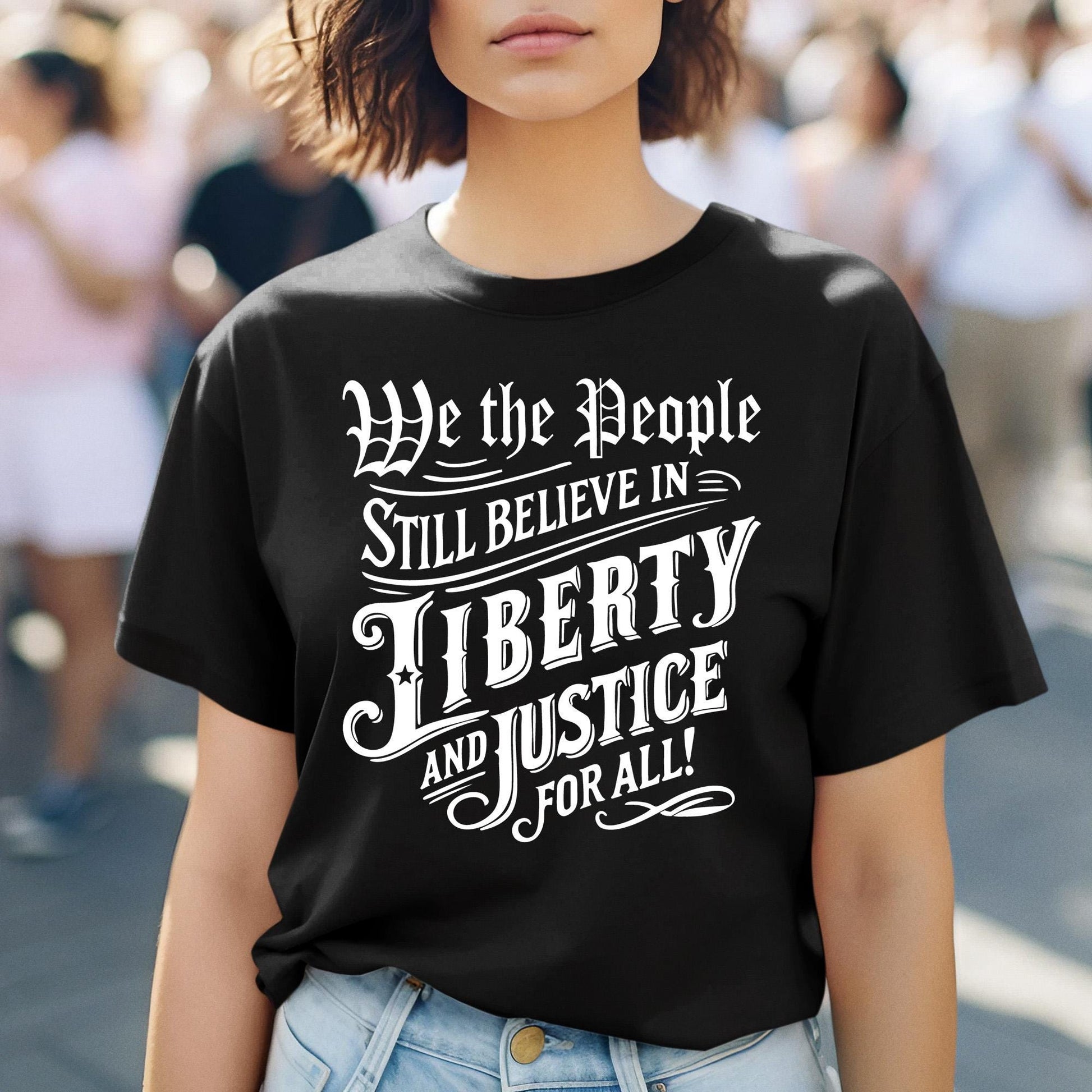 Fourth of July American pride shirt with powerful We the People Still Believe in Justice for All message, democracy-themed patriotic apparel for freedom lovers and equality supporters.